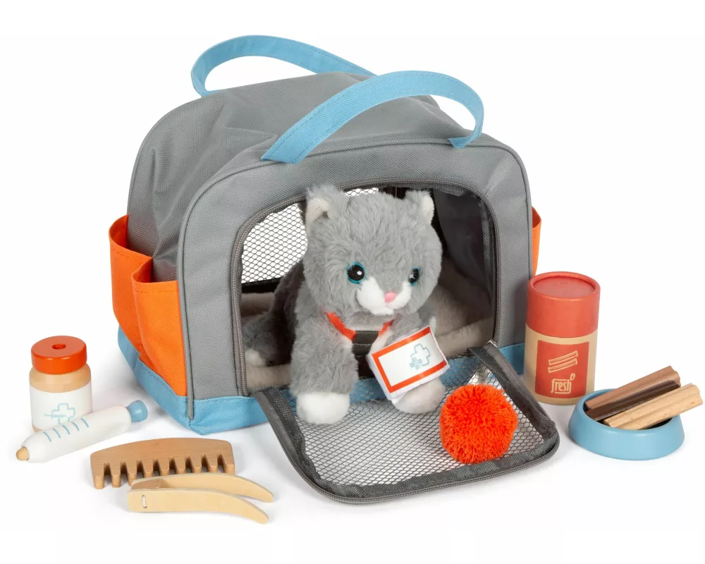 Katze mit Tasche und Pflege-Set