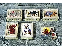 Würfelpuzzle, 6-teilig. Tiere / Holzhintergrund