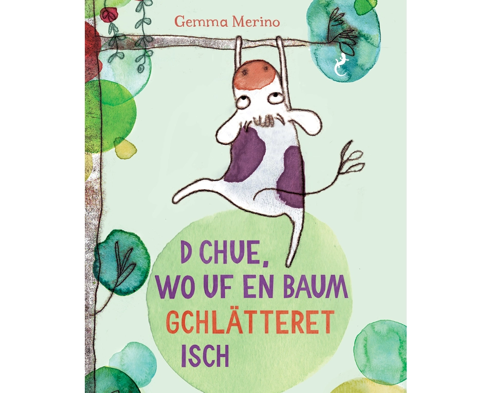 D Chue, wo uf en Baum gchlätteret isch