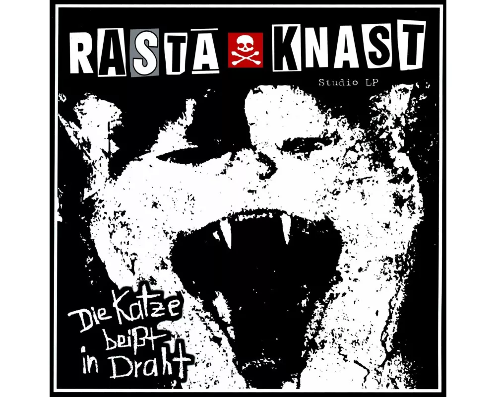 Die Katze Beiát In Draht