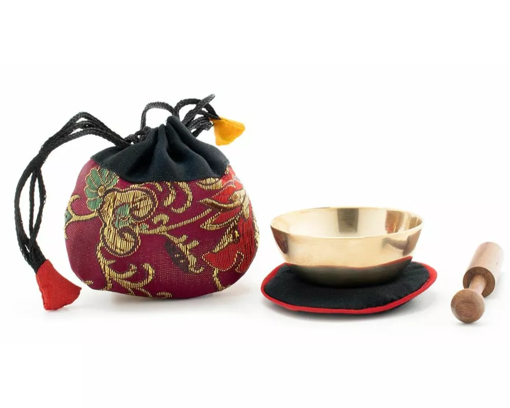 Mini-Klangschale mit gutem Klang in weinrotem Beutel