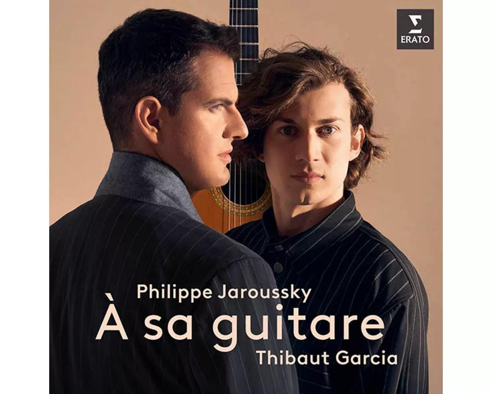 A sa guitare