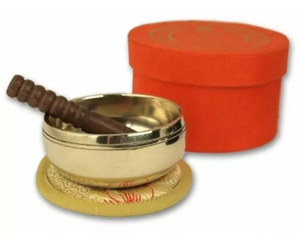 Kleine hochglanz Klangschale in orangefarbiger Box mit Buddha-Aufdruck