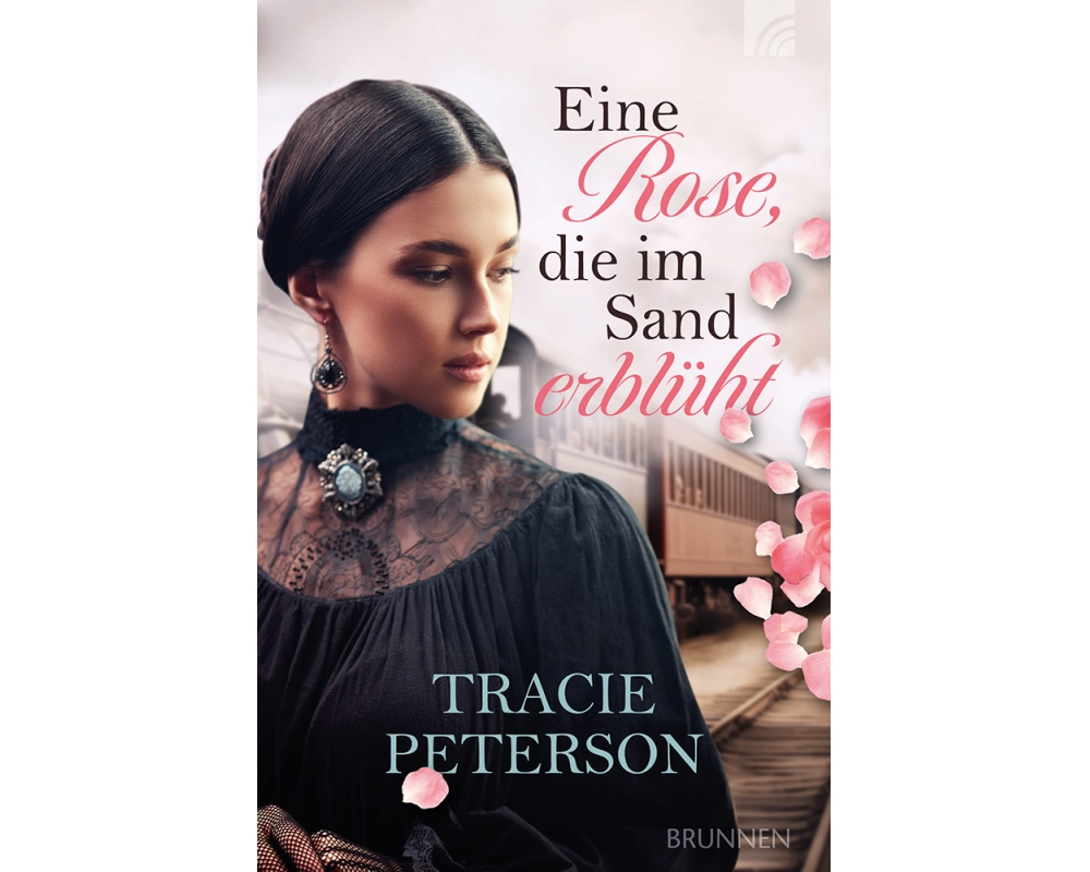 Eine Rose, die im Sand erblüht