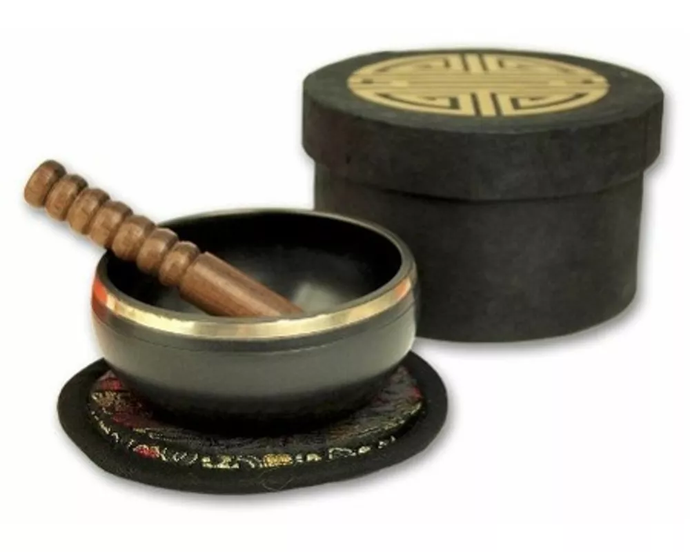 Kleine schwarze Klangschalen in schwarzer, runder Box mit Longevity-Aufdruck