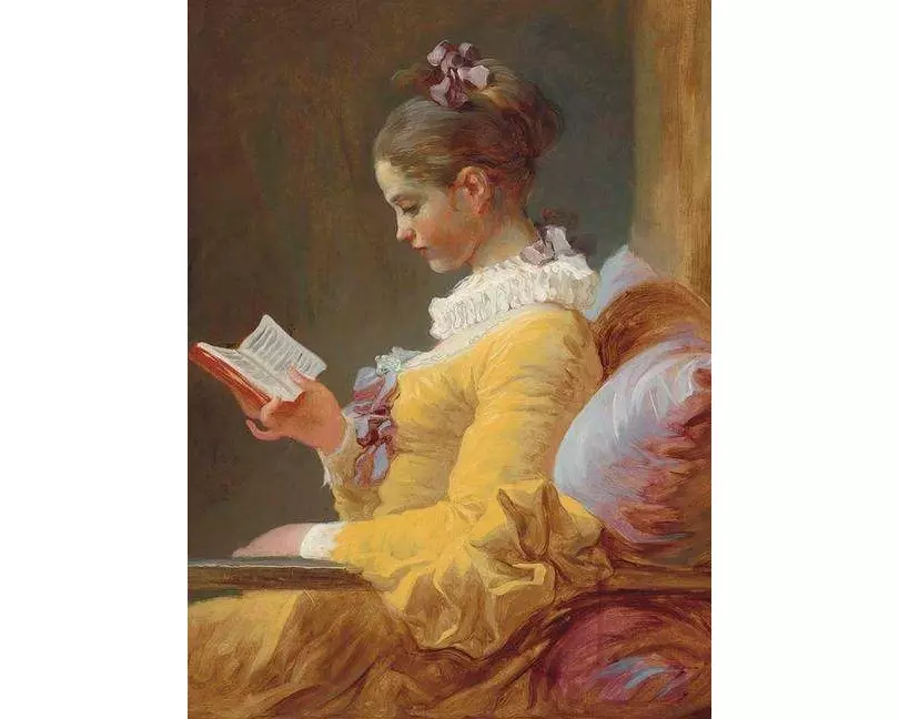 A Young Girl Reading Notebook