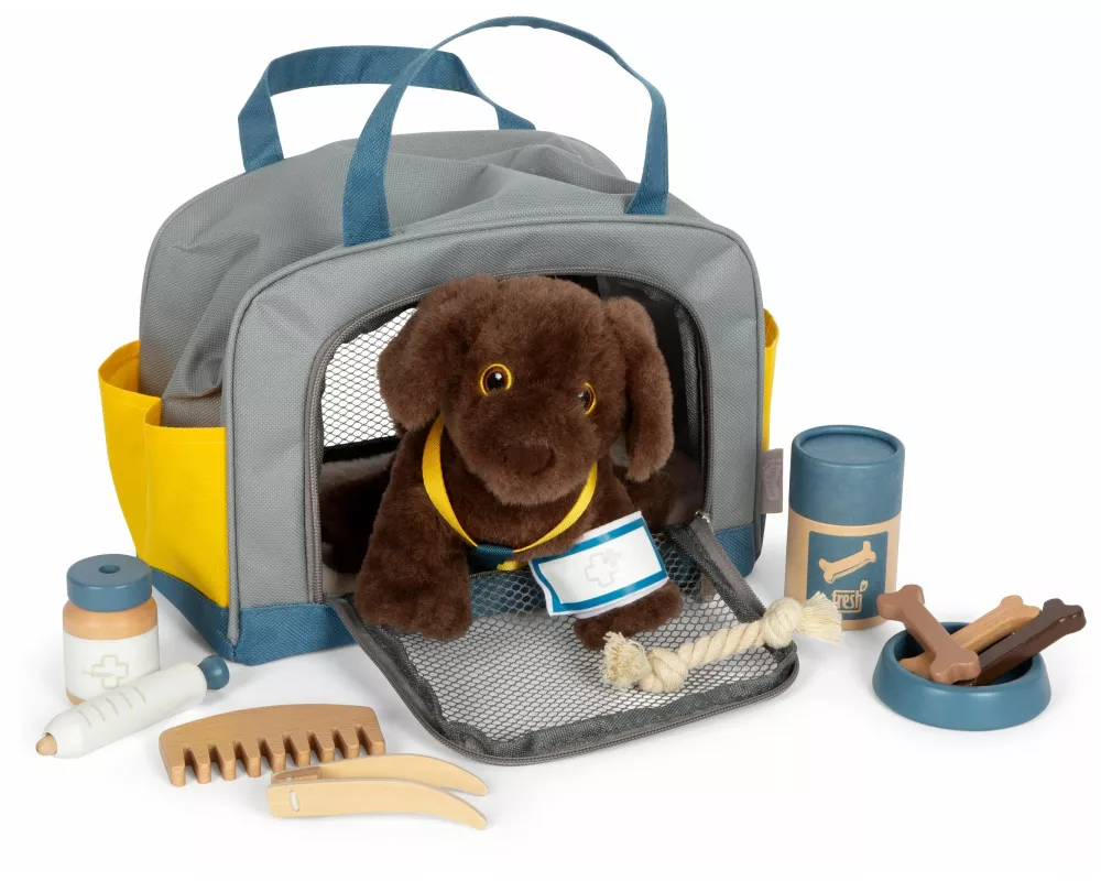 Hund mit Tasche und Pflege-Set