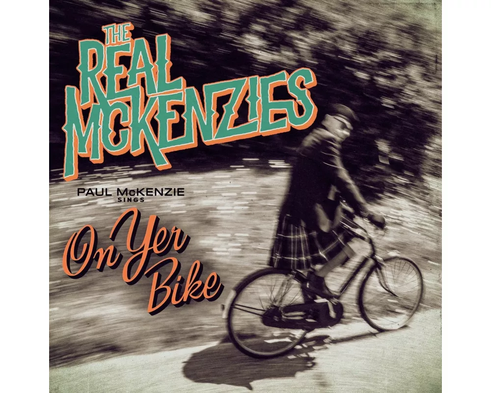 Paul McKenzie Sings On Yer Bike