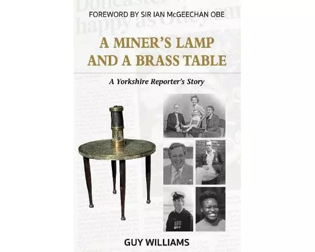 A Miners Lamp and a Brass Table